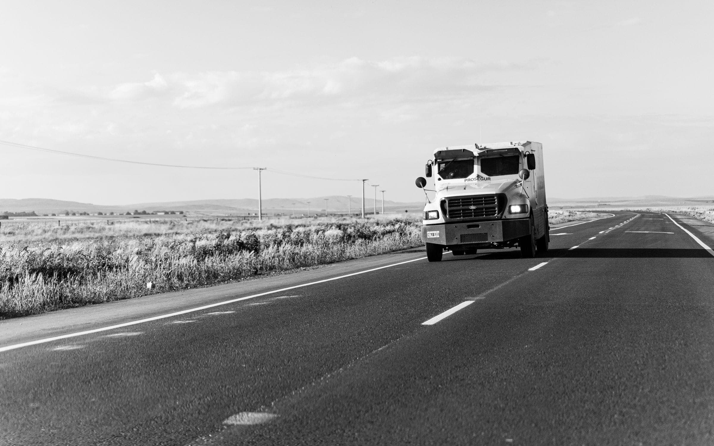 Armoured cash-in-transit vehicle on an open highway
